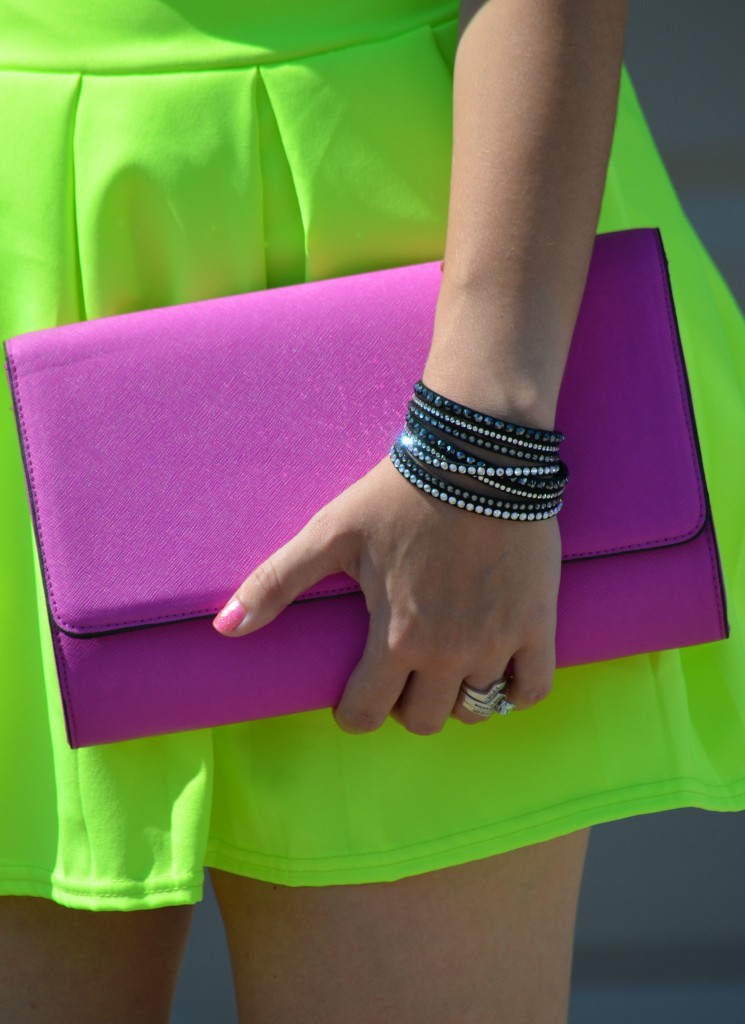 Neon skirt, h&m clutch, black bracelet, wrap bracelet, pink nail polish, short nails, bold and bright