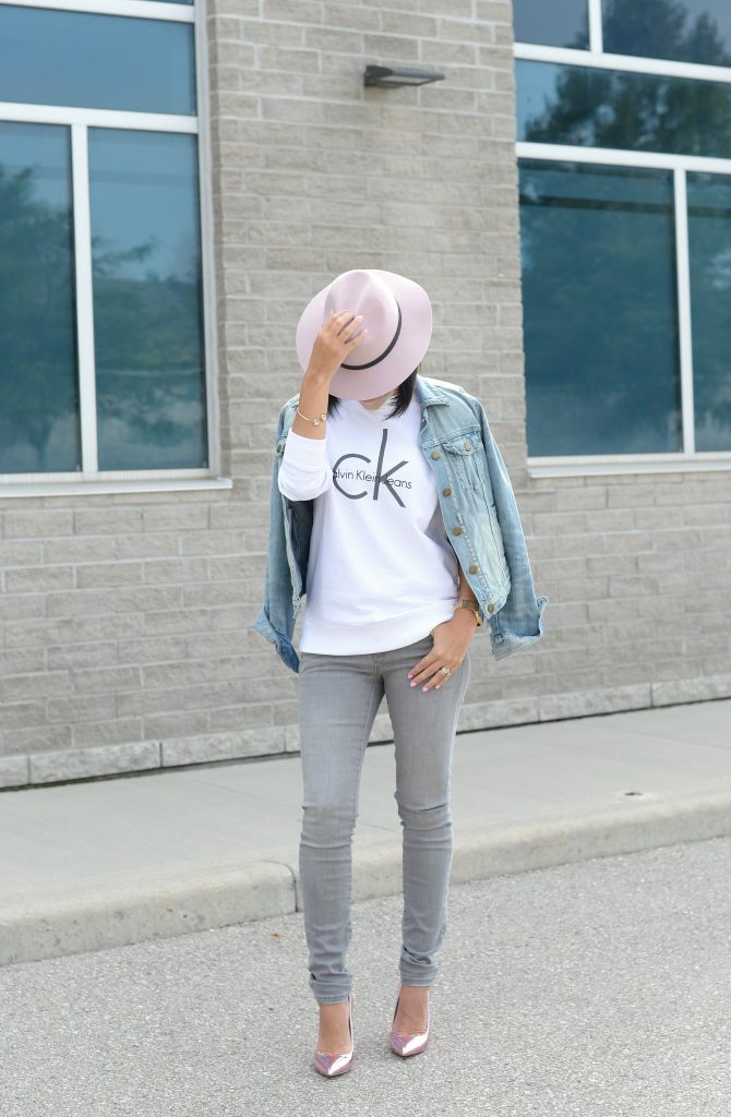 White Calvin Klein Sweater, CK Sweater, Who to wear a Logo Sweater, Toms Sunglasses, Pink Fedoa, Wittnauer Watch, Gold Watch, Denim Jacket, Gap Denim Jacket, How to style a jean jacket, how to style a denim jacket, jean jacket